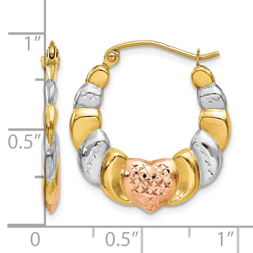 Tri-color gold hoop earrings with alternating polished and textured segments in yellow, white, and rose gold, featuring a heart-shaped charm, displayed with a ruler showing approximately one inch in length.