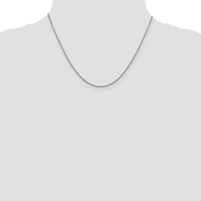 A thin silver chain necklace displayed on a mannequin neck against a light gray background.