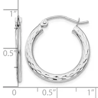 Silver-tone textured hoop earrings with a diameter of approximately one inch, shown with measurement scale and close-up detail of the surface pattern.