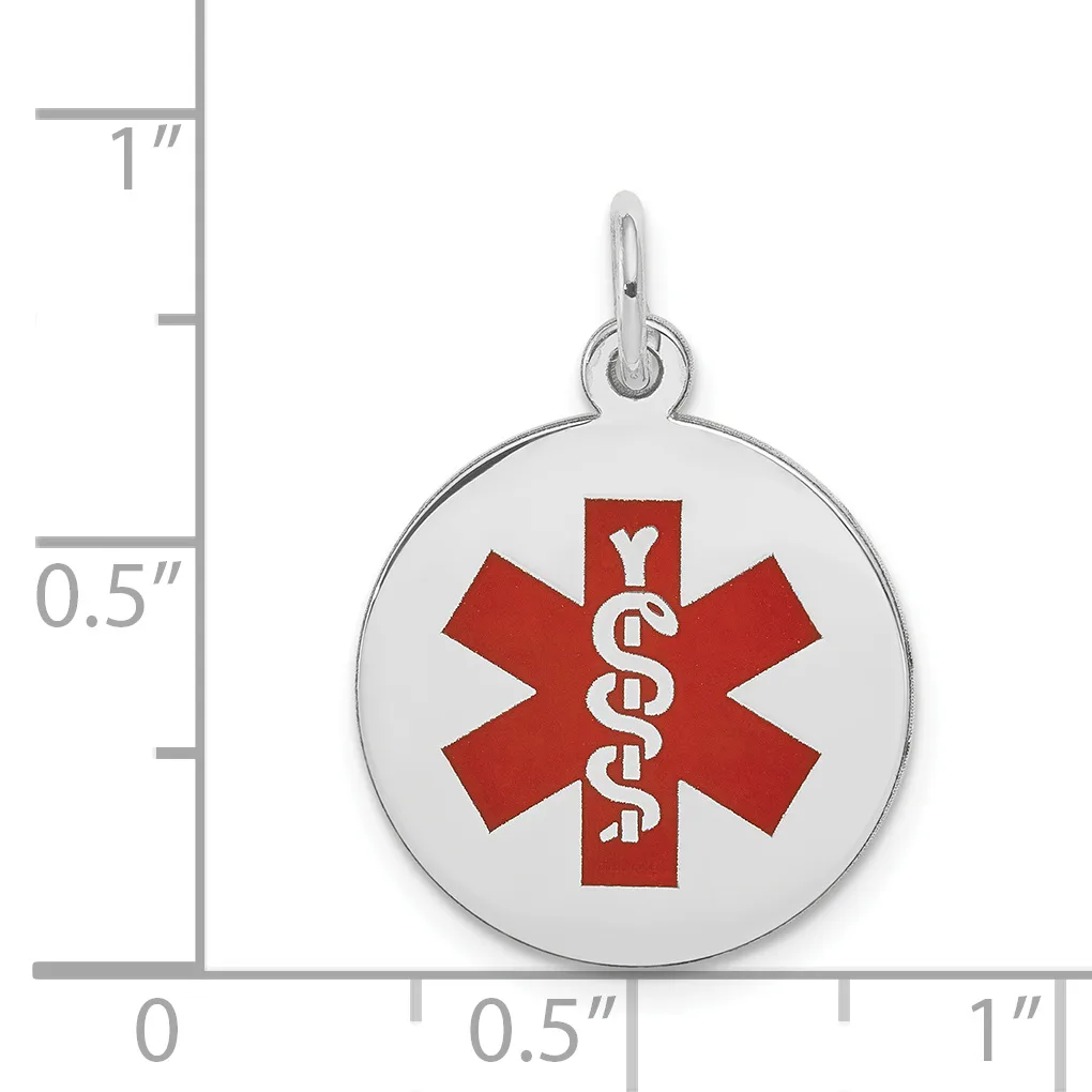 Silver circular medical alert pendant with red star of life symbol and white staff with snakes, shown next to a ruler measuring approximately one inch in diameter.