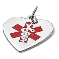 Heart-shaped medical alert pendant with red star of life symbol and staff emblem on white background, suspended from a metal split ring.
