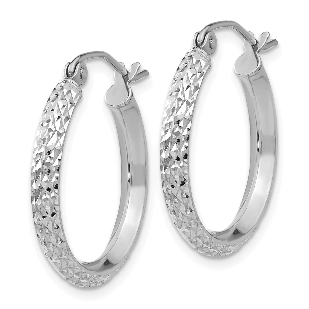 A pair of silver hoop earrings with a textured diamond-cut pattern on the outer surface and smooth polished finish on the inner surface, shown from the front.
