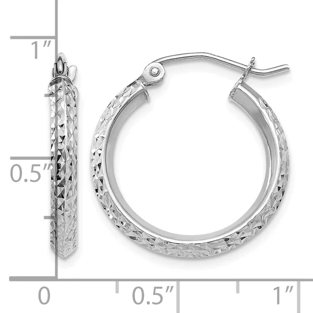Pair of silver hoop earrings with textured diamond-cut surface, approximately one inch in diameter, shown with measurement scale.