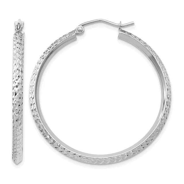 A pair of silver hoop earrings with a textured diamond-cut surface finish, shown from the front and side view.