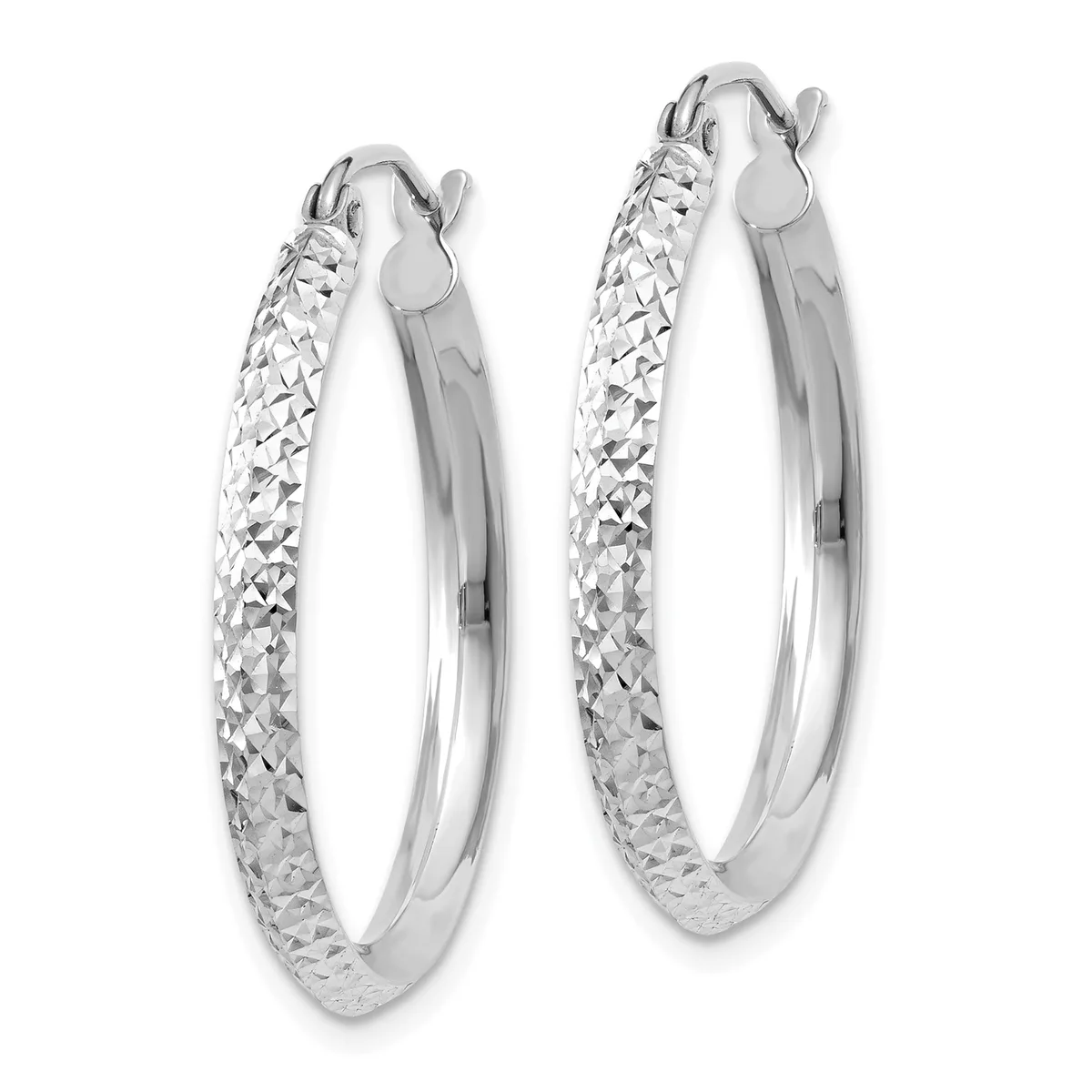 A pair of silver hoop earrings with a textured diamond-cut surface and polished inner edges, displayed against a white background.