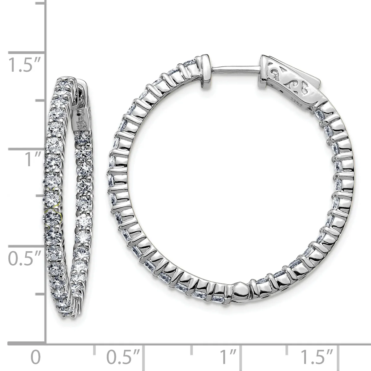 A pair of silver hoop earrings with diamond settings shown from front and side angles against a measurement scale.