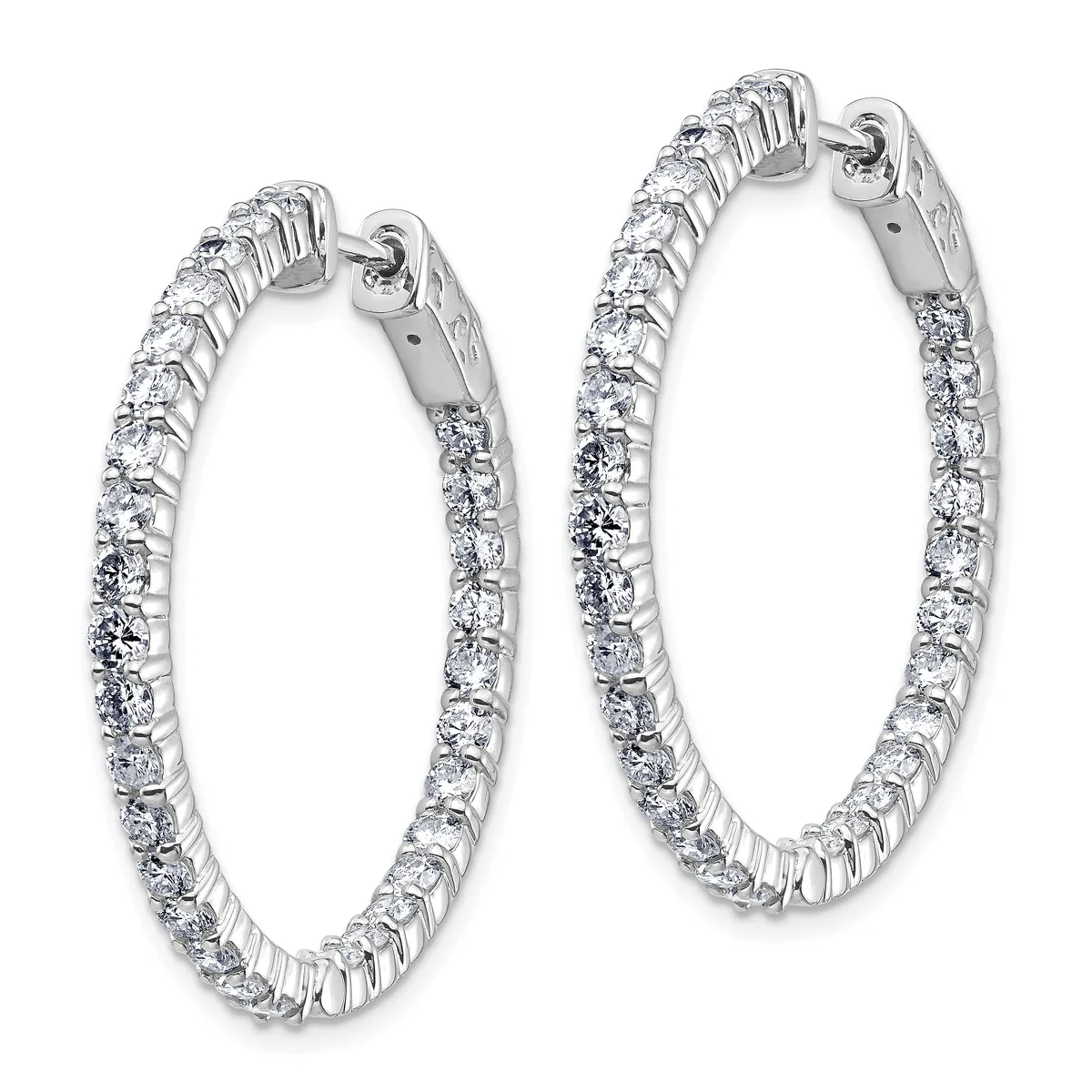 A pair of silver hoop earrings set with round diamonds along the entire surface, displayed side by side against a white background.