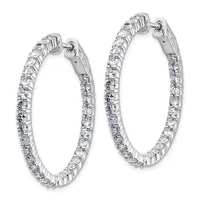 A pair of silver hoop earrings set with round diamonds along the entire surface, displayed side by side against a white background.