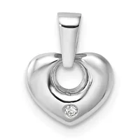 Silver heart-shaped pendant with a small diamond accent at the bottom and a polished bail at the top, displayed against a white background.