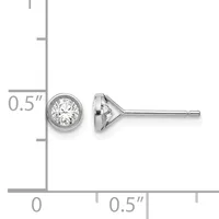 A pair of round diamond stud earrings with bezel settings shown next to a ruler indicating they are approximately 0.5 inches in diameter.