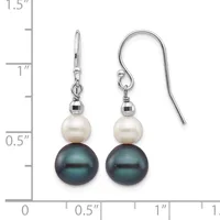 A pair of pearl drop earrings with white freshwater pearls on top and dark tahitian pearls below, suspended from silver-toned metal hooks with small faceted spacer beads, displayed next to a measurement scale showing approximately one inch in length.