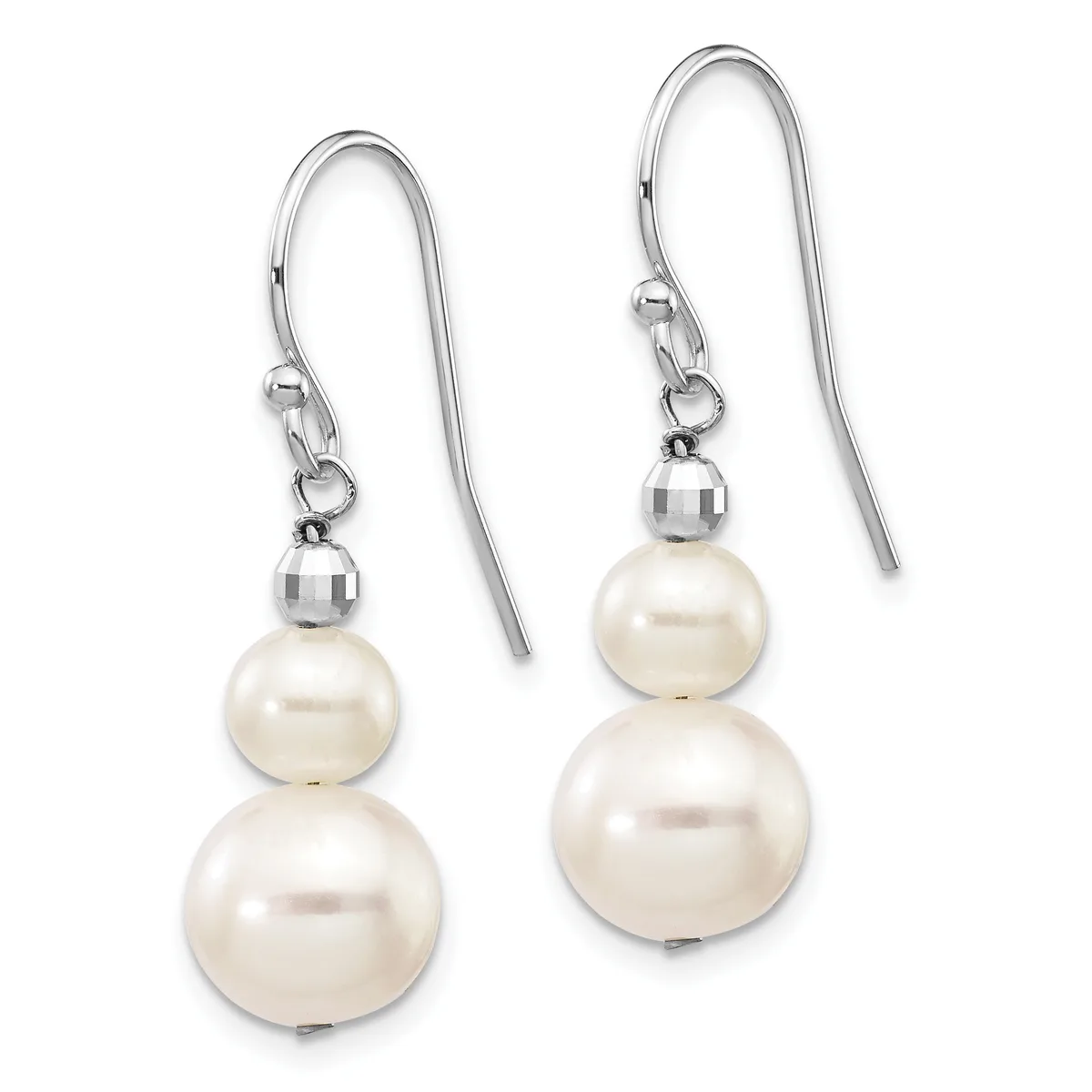 A pair of silver fishhook earrings, each featuring two graduated cream-colored pearl spheres suspended from a small faceted bead.