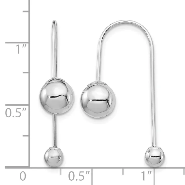 Two pairs of silver ball drop earrings displayed next to a ruler showing measurements up to one inch.