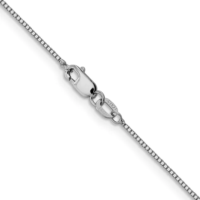 A silver box chain necklace with a lobster claw clasp and small stamped hallmark, displayed diagonally against a white background.