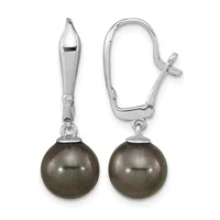 Pair of silver earrings with polished dark gray pearl drops suspended from ornate silver posts with lever-back closures.