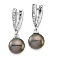 Pair of silver hoop earrings with diamond pave tops and dangling dark gray pearl drops, shown from the front.