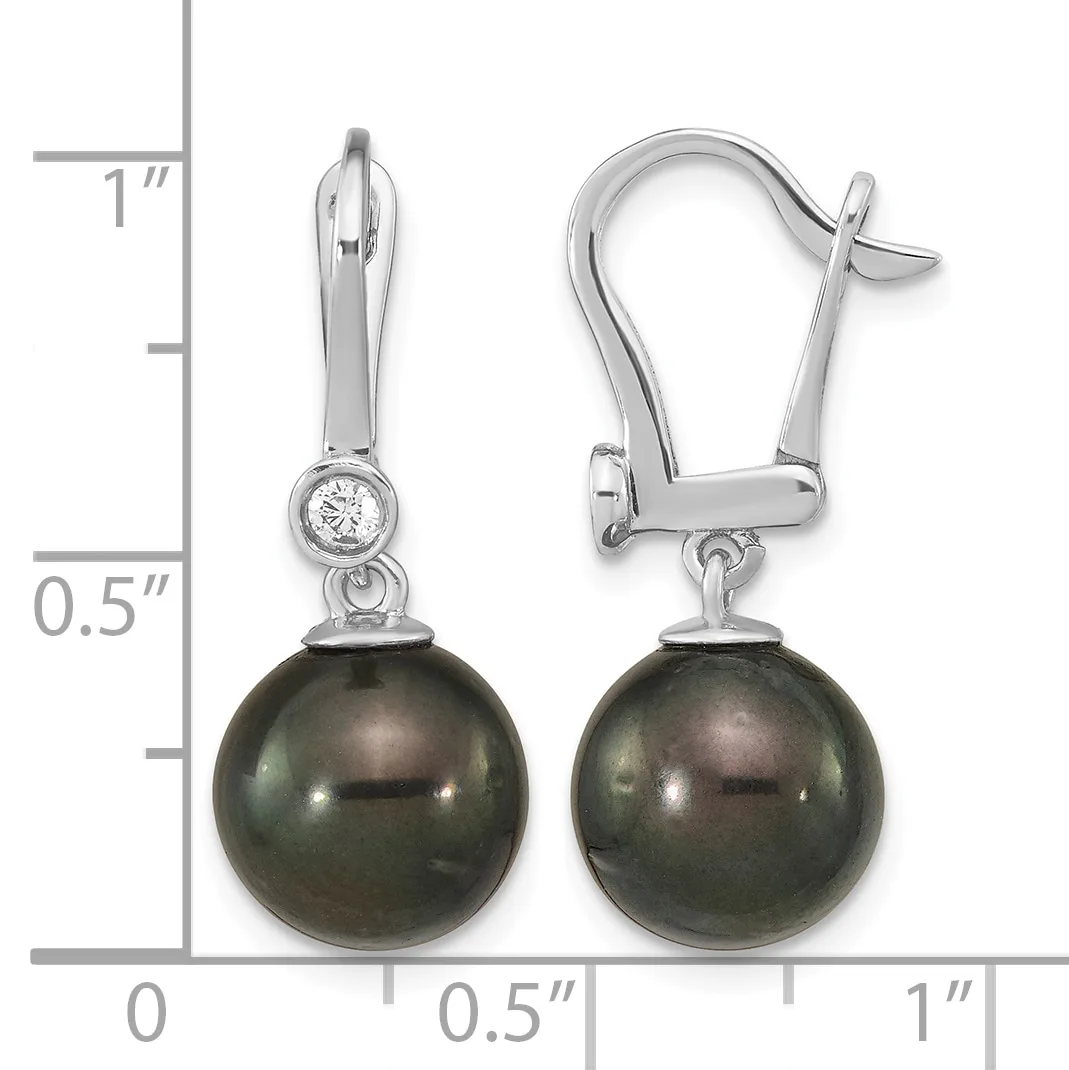A pair of silver lever-back earrings featuring dark gray pearl drops suspended below small round diamond studs, displayed against a measurement scale.