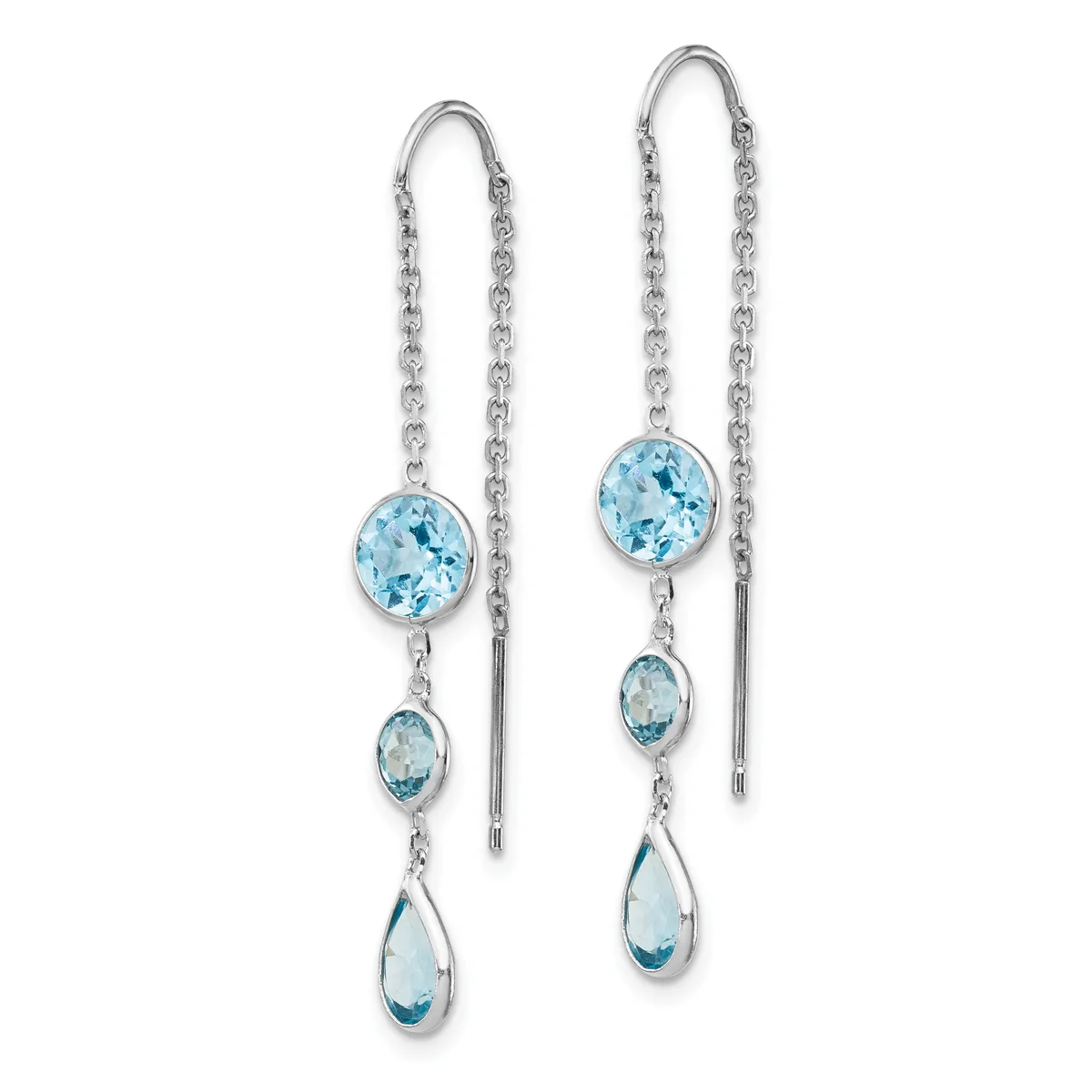 Pair of silver threader earrings with blue topaz gemstones in round and teardrop shapes suspended from delicate chain.