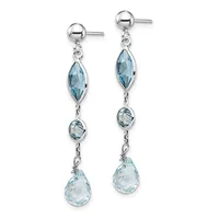 Pair of silver dangle earrings with blue topaz gemstones in marquise and teardrop shapes, hanging from ball studs.