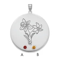Silver circular pendant with engraved flowers and stems, featuring a red gemstone labeled A and an amber gemstone labeled B at the bottom.