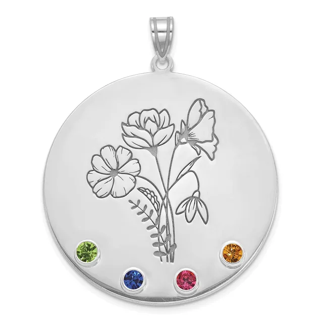 Silver circular pendant with engraved flower bouquet design and four colored gemstones at cardinal points: green, orange, blue, and pink.