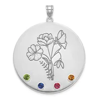 Silver circular pendant with engraved flower bouquet design and four colored gemstones at cardinal points: green, orange, blue, and pink.