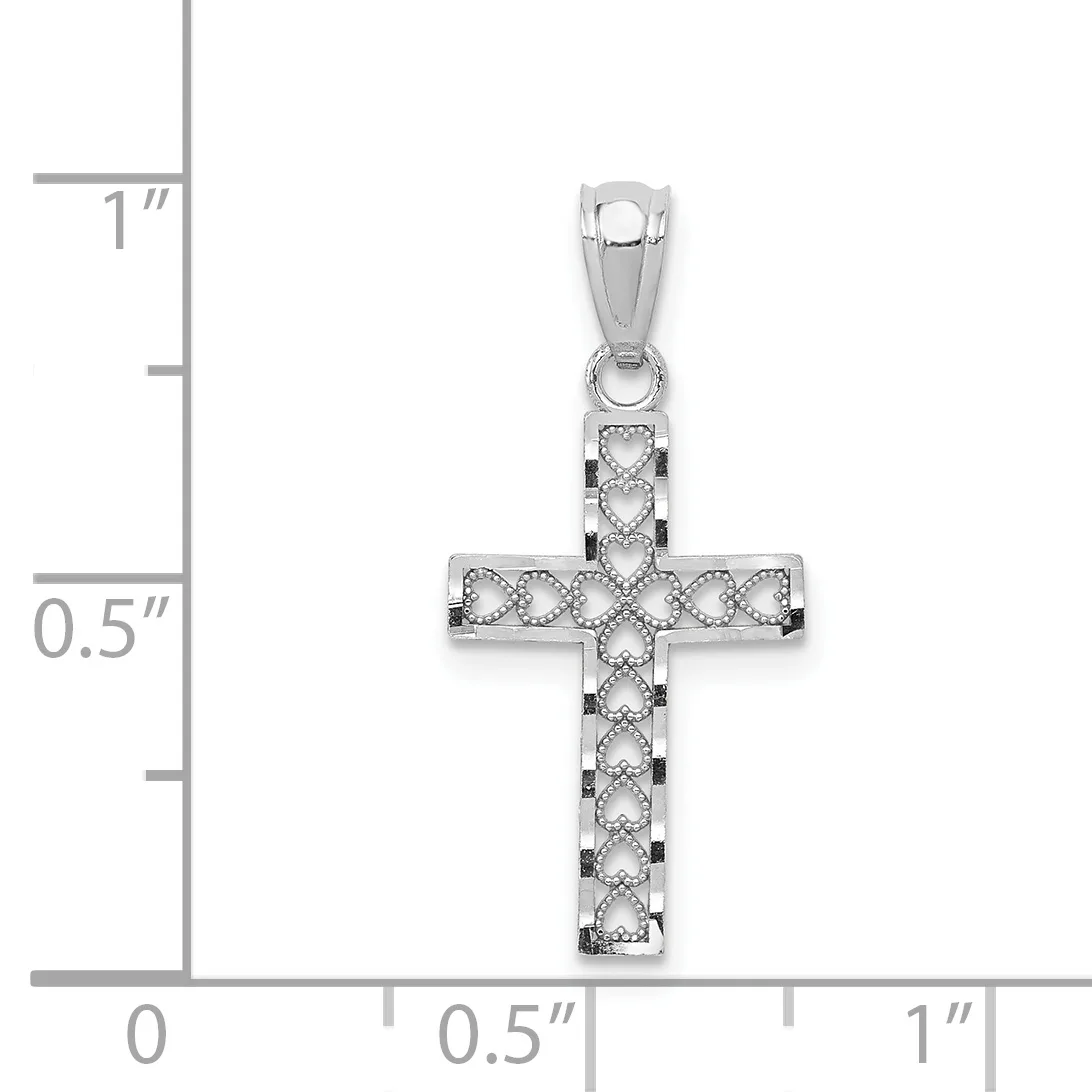 Silver cross pendant with textured surface and small round stones set throughout, displayed against a measurement scale showing approximately 0.75 inches wide by 1 inch tall.