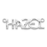 A silver-toned metal connector pendant with the word "travel" cut out in block letters, featuring small loops at each end for attaching to a chain or cord.