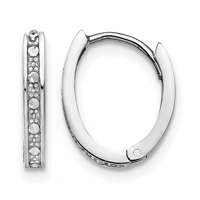 Pair of silver-tone oval hoop earrings with hinged closures, one displaying a channel of round and square crystals along its length.