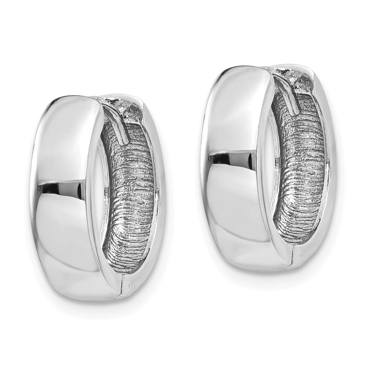 A pair of polished silver hoop earrings with textured inner surfaces, shown from the front and at an angle.