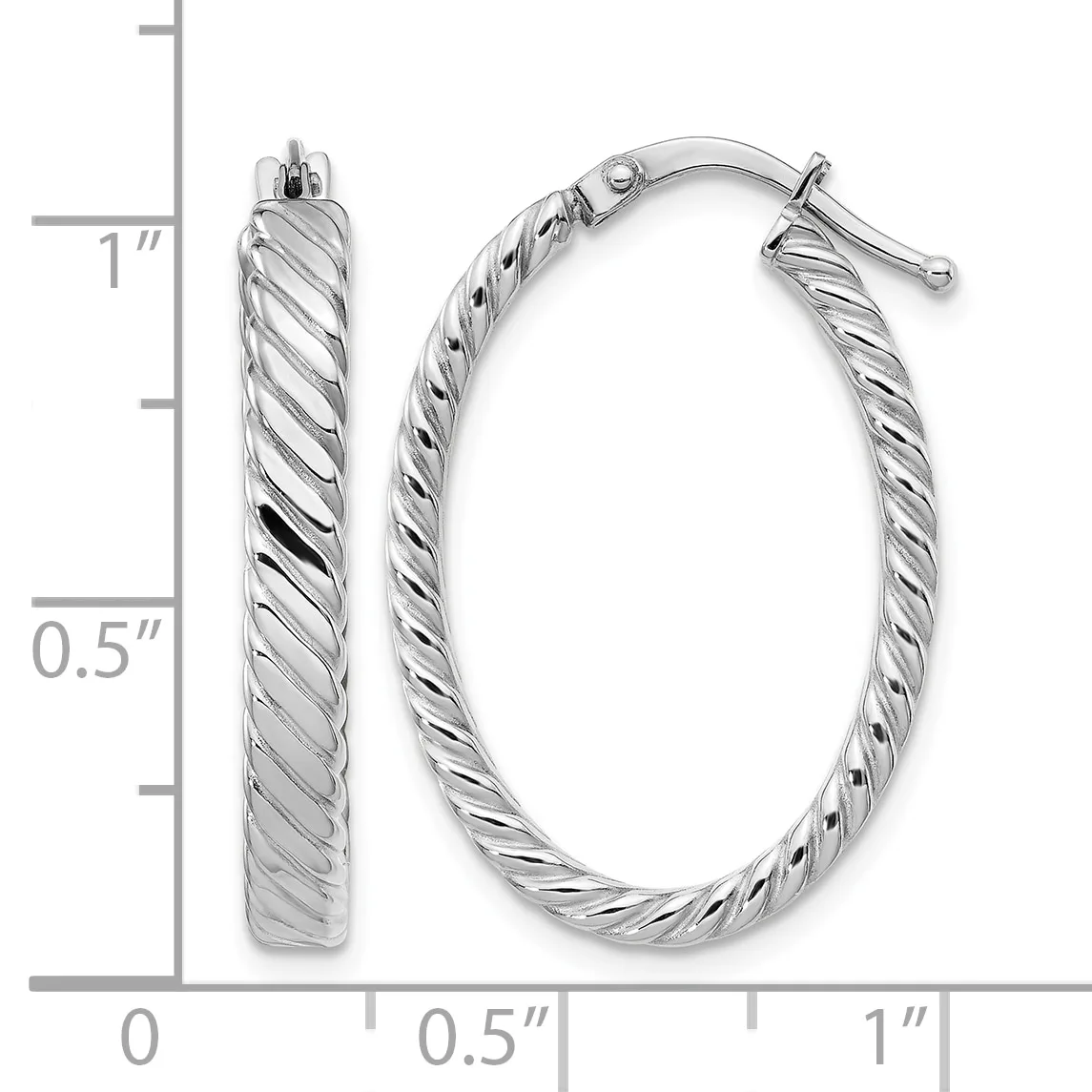 A pair of silver twisted oval hoop earrings displayed next to a ruler showing dimensions of approximately one inch in length and half an inch in width.