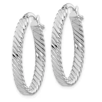 A pair of silver twisted hoop earrings with a diagonal ridge pattern throughout and hinged closures.