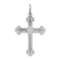 A silver ornate cross pendant with decorative scrolled ends and a small diamond-shaped center detail, shown hanging from a bail against a white background.