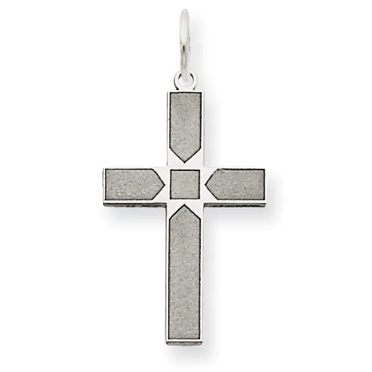 Silver cross pendant with geometric rectangular and pentagonal sections inlaid with gray stone, suspended from a silver bail.
