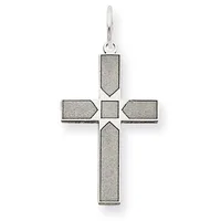 Silver cross pendant with geometric rectangular and pentagonal sections inlaid with gray stone, suspended from a silver bail.