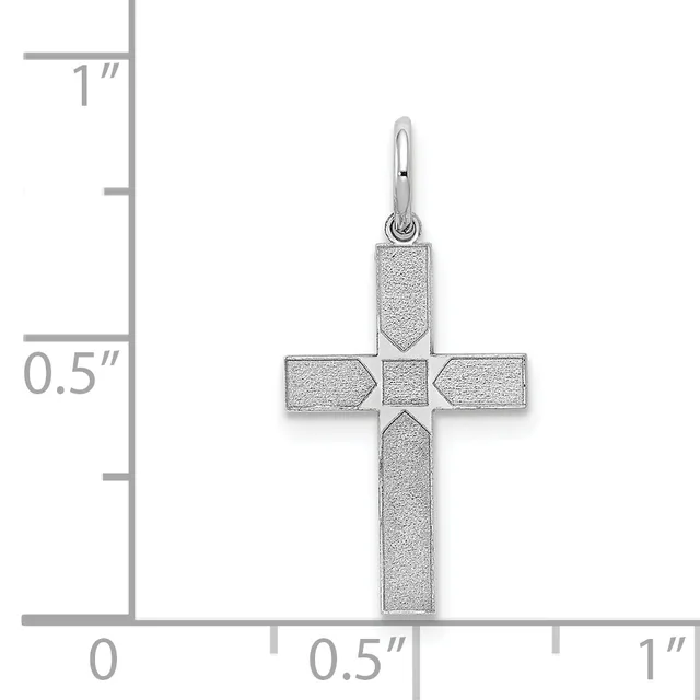Silver cross pendant with textured finish and rectangular arms, shown next to a ruler indicating approximately one inch in height.