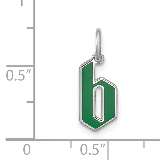 Small silver pendant with green enamel in a hexagonal shape with a cutout oval center, shown next to a ruler indicating approximately 0.5 inches in height.