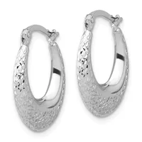 A pair of silver hoop earrings with a textured diamond-cut surface finish and polished smooth inner edges, shown against a white background.