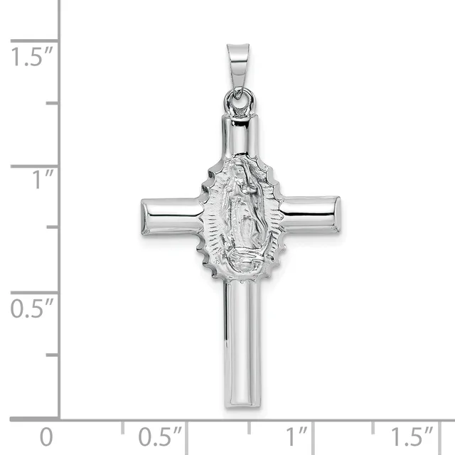 Sterling silver cross pendant featuring a polished cylindrical shaft with an ornate oval medallion depicting a religious figure at the center, shown with measurement scale.