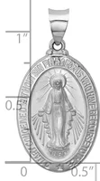Silver oval religious medal pendant with image of robed figure with radiating halo, surrounded by text around border, with small stamped hallmark, shown with measurement scale.