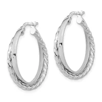 A pair of silver hoop earrings with twisted and smooth textured surfaces, displayed against a white background.