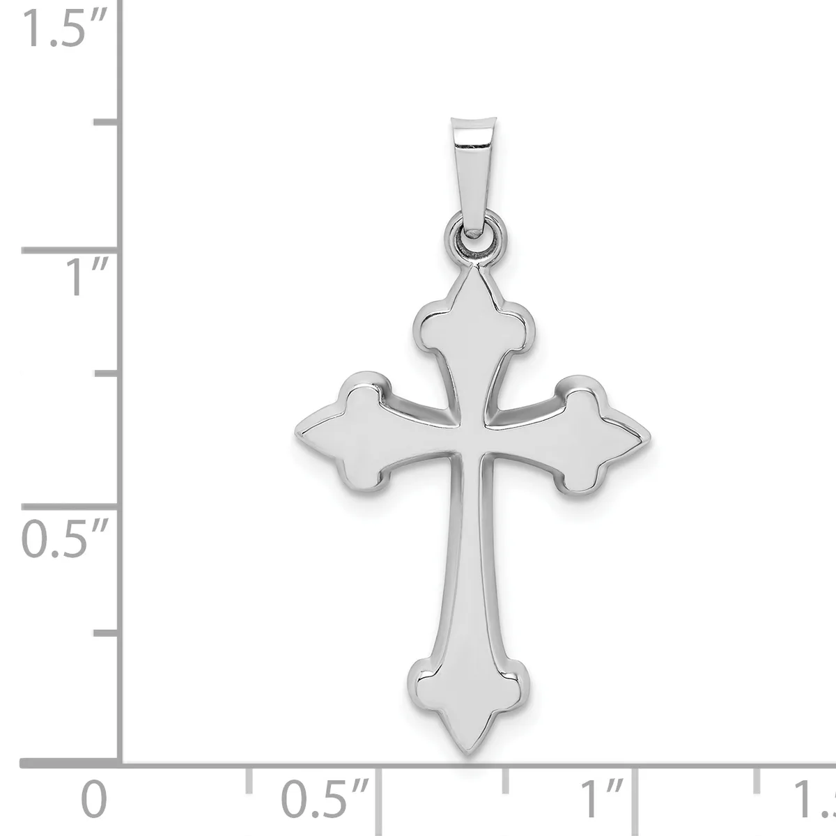Silver cross pendant with flared four-pointed ends, shown next to a ruler indicating it measures approximately one inch in height.