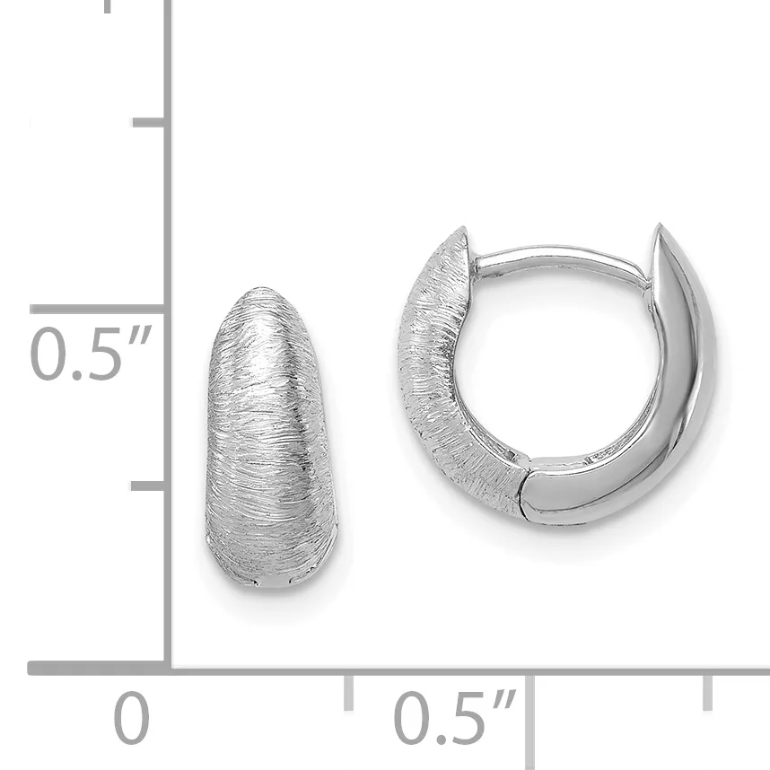A pair of silver textured hoop earrings with a brushed finish, shown next to a measurement scale indicating approximately 0.5 inches in length.
