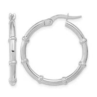 A pair of polished silver hoop earrings with decorative banded segments, shown from the front and side views.