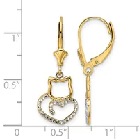 Gold-tone leverback earrings featuring a cat head outline suspended above a heart outline accented with cubic zirconia stones, displayed next to a measurement ruler.