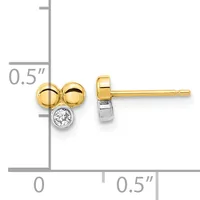 Two gold spheres with a white diamond in a bezel setting below, shown on a ruler indicating the earring is approximately half an inch in size.