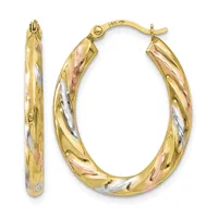 Pair of tricolor gold hoop earrings with twisted design and hinged posts, shown front and side view.