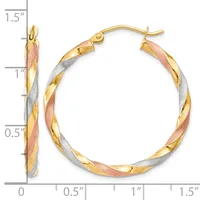 Tricolor twisted hoop earrings in yellow, white, and rose gold with a ruler showing approximately 1.25 inches in diameter.