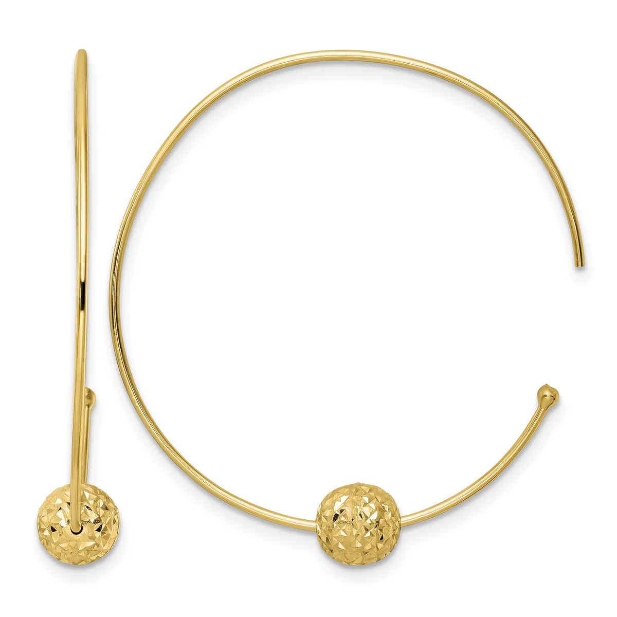 Gold-toned open bangle bracelet with textured spherical ball ends, shown with a matching curved hook earring against a white background.