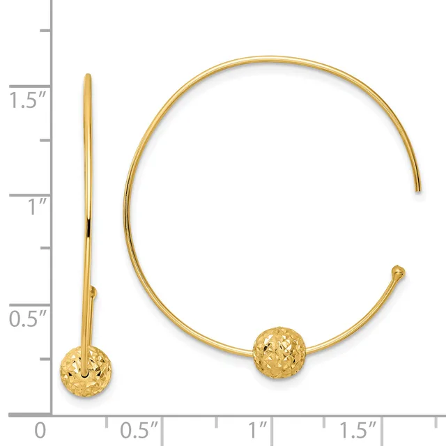 Gold-colored cuff bracelet with textured spherical ends, shown open with a measurement scale indicating approximately 1.5 inches in length.